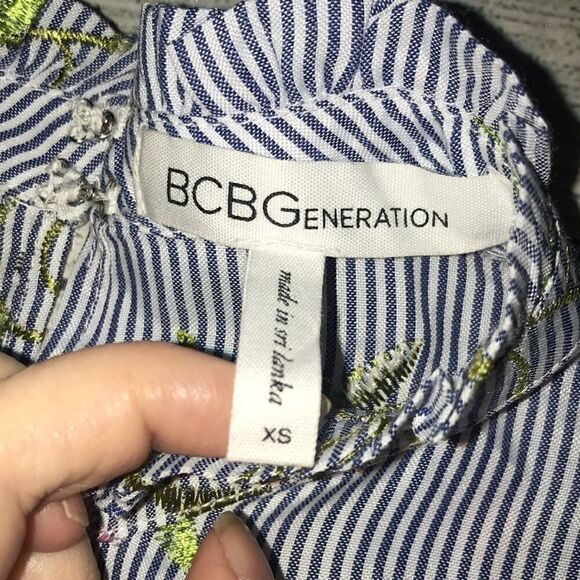 BCBGeneration Sleeveless Ruffle Embroidered Top - Picture 4 of 7